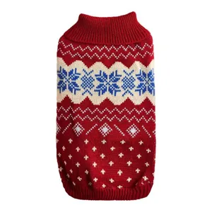 Cozy winter dog sweater featuring red knit design with white and blue Nordic snowflake patterns.