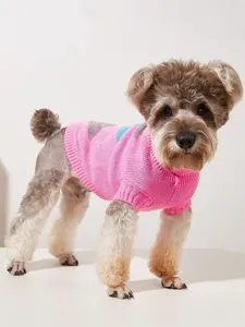 Cozy pink pet sweater with diamond pattern, perfect for small dogs like schnauzers and poodles.
