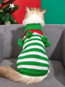 Christmas pet knitted sweater detail showing colorful stripes and cute pom-pom design.
