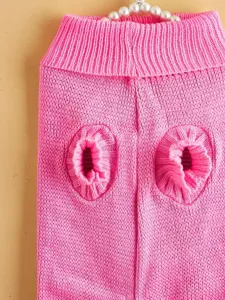 Pink knitted dog sweater detail shot, soft and warm pet apparel for small dogs, winter pet clothes.