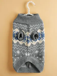 Detailed view of grey knitted pet sweater with warm snowflake pattern and cozy high collar.