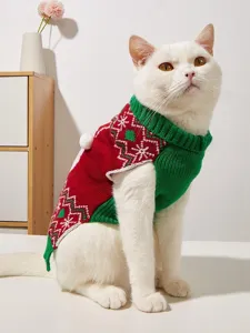 Detailed view of the Christmas pet sweater with knit snowflake pattern and cute pom-pom.