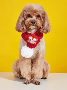 Red knitted pet scarf with lion dance embroidery and white pom-pom for small dogs.