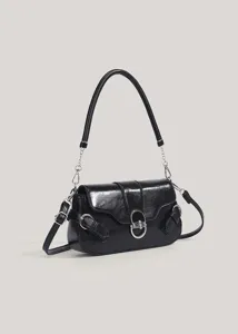 Close-up detail of the black PU leather shoulder bag featuring unique silver hardware and lock.