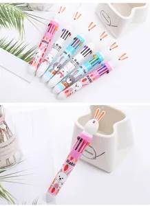Detailed view of cute rabbit 10-color ballpoint pens with cartoon design and ceramic pen holder.