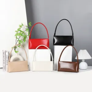 Minimalist vintage baguette shoulder bag, stylish PU leather handbag for women daily wear.