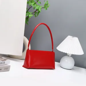 Minimalist red leather shoulder bag, trendy chic baguette handbag for women daily wear.