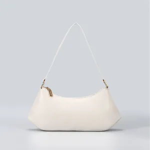 Minimalist off-white underarm shoulder bag detail showing premium handbag hardware.
