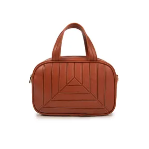 Stylish brown PU leather handbag with geometric quilting, dual top handles and versatile strap.