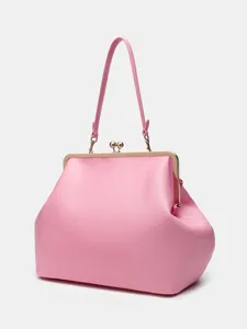 Pink vintage kiss-lock handbag for women, elegant faux leather top handle tote bag for daily commute.