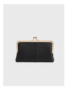 Close-up of black leather kiss-lock clutch purse, retro metal frame detail storage bag.