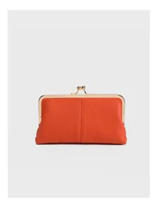 Retro orange leather kiss-lock coin purse and lipstick clutch wallet for women daily use.