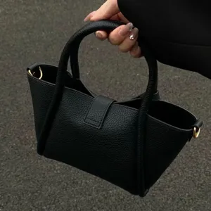 Black pebbled leather handbag, soft bucket bag with top handles, elegant daily tote.
