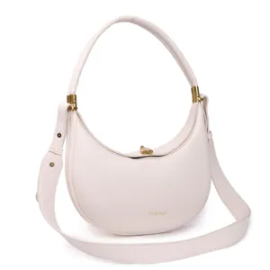 Detailed shot of the elegant white leather crescent shoulder bag showcasing golden hardware.