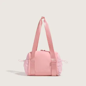 Pink nylon gym fitness shoulder bag detail view, large capacity casual daily carry.