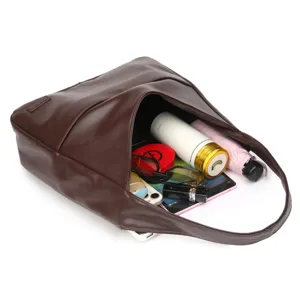 Retrobraune weiche Leder-Totetasche mit grossem Fassungsvermoegen fuer Alltag und Pendeln.