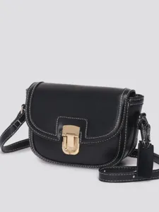 Women stylish black saddle bag with contrast stitching and golden clasp for daily wear.