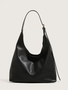 Minimalist black slouchy shoulder bag for women, large capacity vintage hobo tote for daily commute.