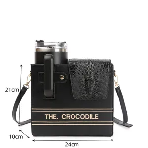 Detailed view of the black crocodile pattern tumbler crossbody bag with dimensions and strap.