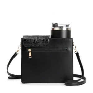 Black crocodile pattern crossbody cup bag detail with tumbler holder and zipper pocket.