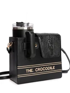Black leather crocodile pattern tumbler crossbody bag with cup holder and chic embroidered front band.