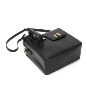 Black tumbler carrier bag detail, portable PU leather water bottle shoulder bag with strap.