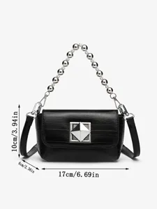 Black crocodile pattern mini square handbag with metal ball chain handle and geometric lock.