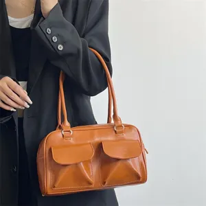 Retro orange shoulder bag for women, large capacity minimalist PU leather tote for daily use.