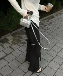 Silver metallic mini handbag, stylish shoulder crossbody small bag for women daily fashion.