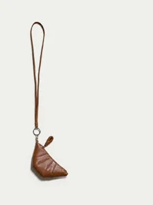 Mini brown croissant coin purse with long lanyard, stylish mini handbag detail display.