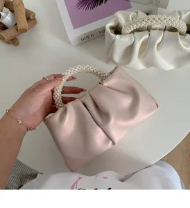 Sweet pearl handle ruched cloud bag detailed view for women stylish mini crossbody.