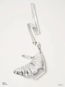 Mini metallic silver croissant coin purse with long strap, stylish detail view product.
