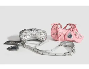 Women metallic silver and pink studded crescent shoulder bag, stylish crossbody hobo purse.
