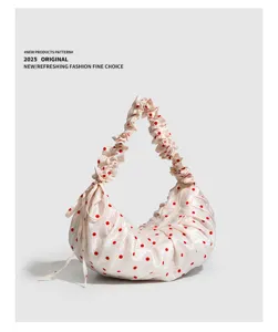 Stylish pleated polka dot dumpling bag with drawstring and zipper for women commute fashion