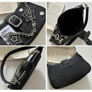 Retro denim underarm shoulder bag with metal chain, star embroidery and chic buckle details.