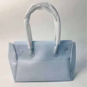 Light blue PVC tote bag large capacity shoulder handbag classic stylish design for daily use