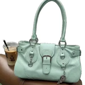 Mint green Y2K motorcycle shoulder bag, trendy street style leather tote handbag for women.