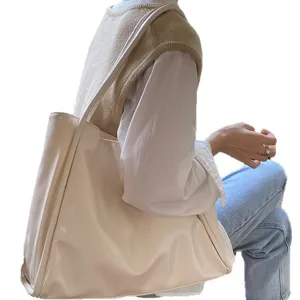 Large capacity women's shoulder bag, stylish PU leather tote handbag for daily casual wear.