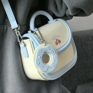 Graziosa mini borsa a sella stile giapponese in pelle PU con ricamo ciliegia.