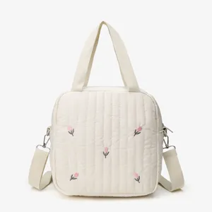 Chic quilted tote shoulder bag with cute embroidered pink tulips, lightweight and stylish.