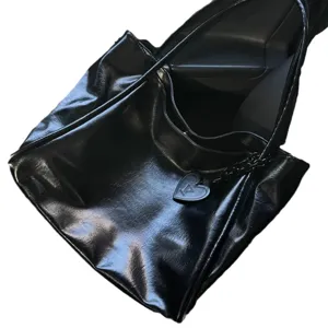 Black glossy tote bag with heart pendant large capacity minimalist design commuter shoulder bag