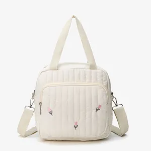 Quilted shoulder bag with cute floral embroidery, lightweight casual tote purse for women.