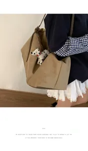 Korean casual large capacity suede shoulder underarm bag with charming pendant for women daily use