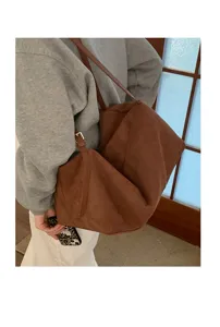 Casual suede shoulder bag for women, large capacity minimalist underarm pillow bag detail view.