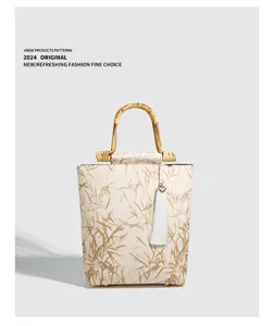 Retro Chinese style bamboo handle handbag, elegant tassel pendant, spacious daily casual bag.
