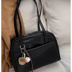 Black PU leather shoulder bag with baseball charm, vintage tote bag for women daily use.