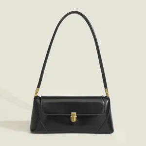 Classic black vintage baguette shoulder bag for women, elegant minimalist PU leather purse.