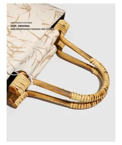 Bamboo handle handbag detail, vintage Chinese style fabric close-up, elegant craft texture.