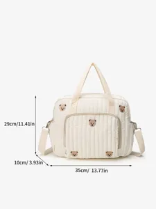 Quilted diaper bag with cute bear embroidery, spacious tote and crossbody design for mom.