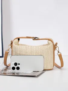Geweven strooien crossbody tas voor dames, casual zomertas met kunstlederen afwerking.